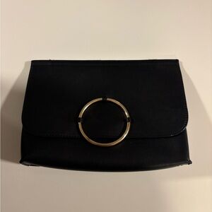 Sleek Black Clutch with Gold Ring by TOPSHOP